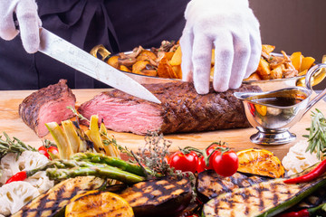 A section of fried meat on a grill