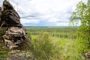 Fototapeta na wymiar Rocks in the forest of Siberia