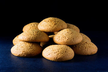 Useful cookies on a dark background. Healthy food and diet.