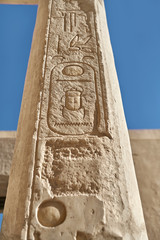 Ancient egyptian obelisk covered with hieroglyphs in Luxor