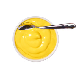 Cheese sauce in ceramic bowl isolated on white background.Top view