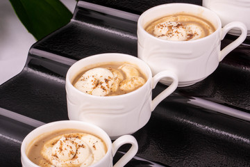 Cream champignons soup, is served in tureens