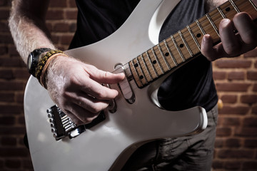 Fototapeta premium Playing white guitar
