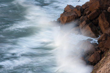 Waves hitting the rocks