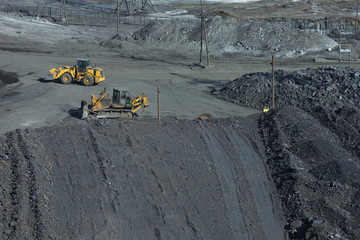 Industrial machinery on the territory of the ore dressing combine.