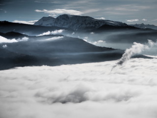 Fototapeta na wymiar Sea of clouds above the city of Grenoble, France