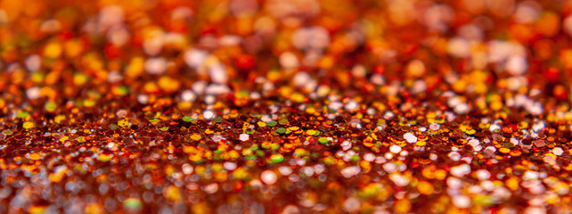 Orange glitter abstract background