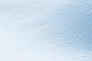Fresh snow background texture. Winter background with snowflakes and snow mounds. Snow lumps.