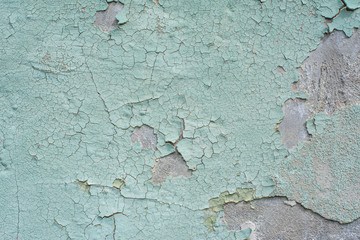 Close-up detail of cracked paint on wall.