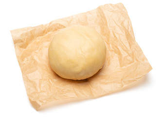 unrolled and unbaked Shortcrust pastry dough on white background