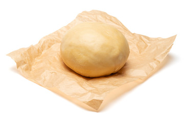 unrolled and unbaked Shortcrust pastry dough on white background