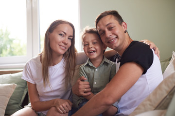 Young family being playful at home