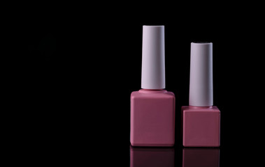 nail polish and brush on white background