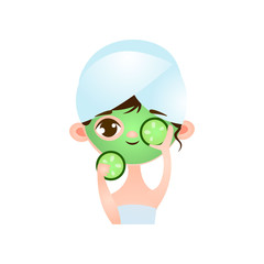 Young cute little girl caring for her problem skin making a mask on her face.