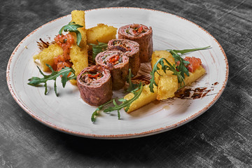 Traditional russian or moldavian or romanian or ukrainian food called mamaliga.Italian traditional Polenta, porridge made from cornmeal.