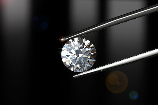 Diamond in tweezers isolated on a black background, 3d rendering.