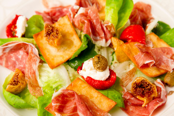 jamon prosciutto with fig quail poached egg and dried olives