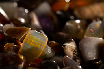 background from multicolored polished stones background texure close up