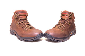Pair of winter boots in front on white isolated background