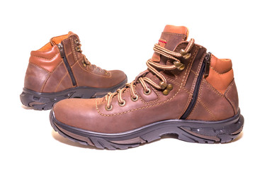 Pair of winter boots on a white isolated background