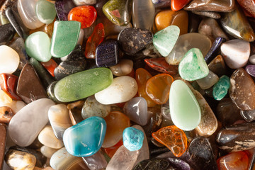background from multicolored polished stones background texure close up