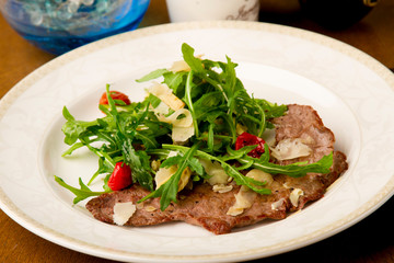 straccetti with arugula parmesan and dried tomatoes