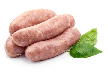 German Oktoberfest Sausages with basil leaf, close-up, isolated on white background