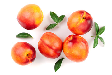 ripe nectarine with leaves isolated on white background. Top view. Flat lay pattern