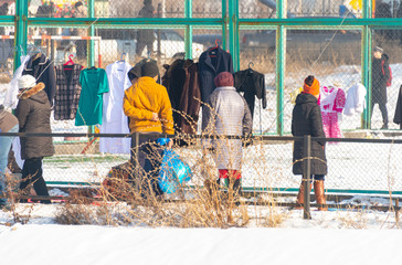 winter flea market, people buy old stuff