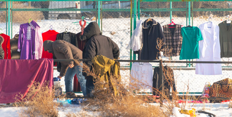 winter flea market, people buy old stuff