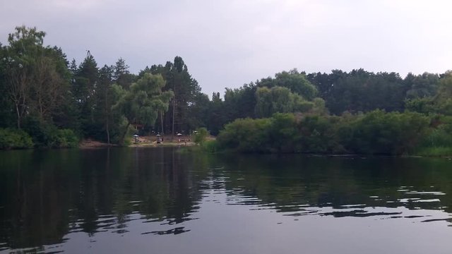 View of the banks of the Dnieper from the motorboat