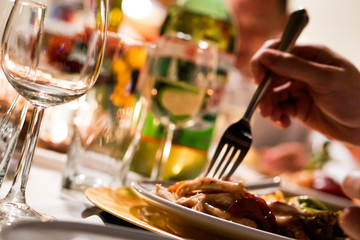 Beautiful Table with Person Eating Pasta for Dinner
