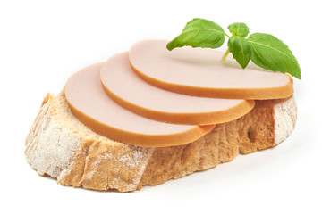 Sandwich with cooked sausage and basil leaf, close-up, isolated on white background