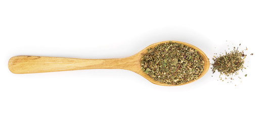 mix Provencal herbs in wooden spoon isolated on white background. Top view