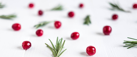 Cranberry pattern on white wooden background. Background with cranberries. Useful berries. Flat lay, top view.