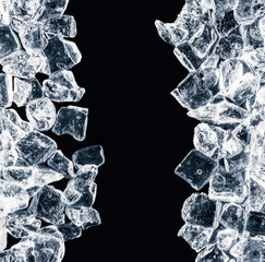 Pieces of crushed ice cubes on black background.