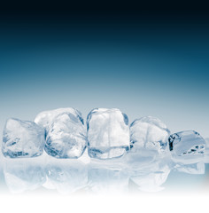 Ice cubes on blue background. Clipping path included.
