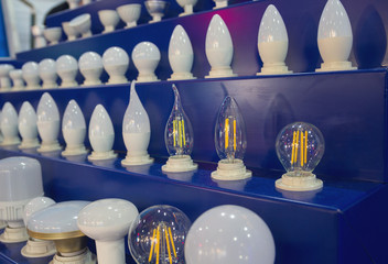 Assortment electric lamps on the counter. Sales