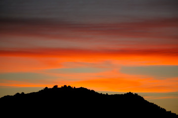 Brilliant pink sunset over the mountains in San Diego California