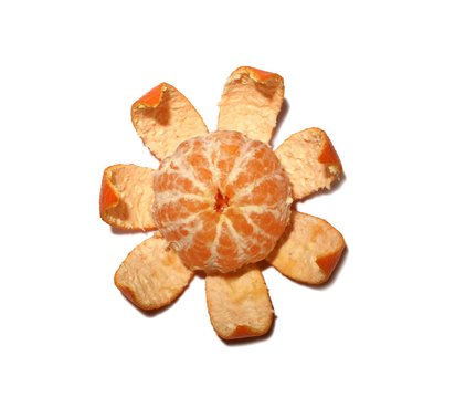Juicy tangerine is isolated on a white background.