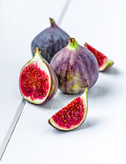 Fresh figs on a white ground