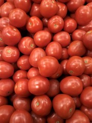 beautiful red fresh tomatoes, close up, agriculture environmentally friendly, it is useful for health