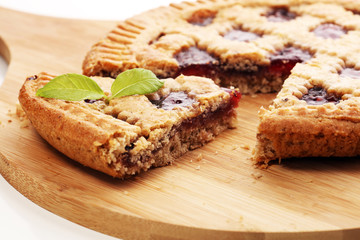 Vertical slice of pie tart cake dessert sweet treat.