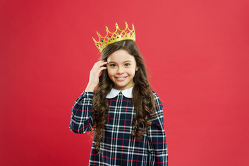 Girl wear crown red background. Monarch family concept. Princess manners. Monarch attribute. Kid wear golden crown symbol of princess. Every girl dreaming to become princess. Lady little princess