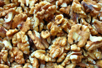 Fresh walnuts. View from above. Close-up. Background.