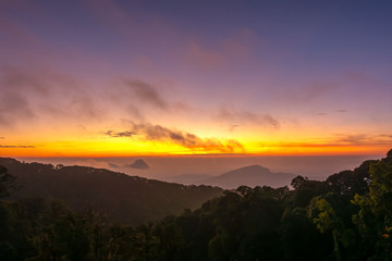 Landscape view of mountains and mist at sunrise time at Doi Inthanon National Park, Highest peak in Thailand, Chiang Mai Province, Thailand.