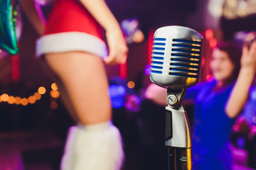 Microphone. Christmas music concept karaoke. Disco. New year celebration.