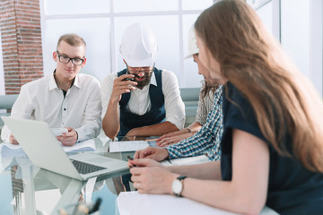 architect and design team discussing ideas for a new project