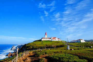 Fototapeta na wymiar Cape Roca lighthouse. Cabo da Roca most western point in Europe. Travel tourism landmark in Sintra and Lisbon, Portugal
