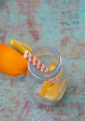 top of milk jar with paper straw